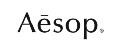 A logo of Aesop in the luxury skincare retail sector.
